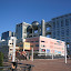 The Aqua City shopping center at Odaiba, with the Fuji TV building behind it The Aqua City shopping center at Odaiba, with the Fuji TV building behind it