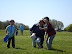 Eidan, Kai, and Mike flying a kite at Brenton Point in Newport