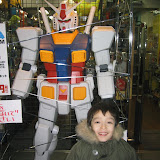 Kai with a giant Gundam, at a toy store in Ebisu, Tokyo Kai with a giant Gundam, at a toy store in Ebisu, Tokyo