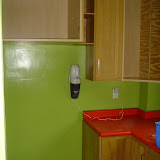 The kitchen pantry room, with the fridge already moved out and some cabinets partially disassembled
