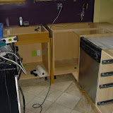 The cabinets, plumb and level, which was a challenge with our sloped floor and bowed walls