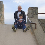 Eidan and my dad on the stone slide at Murphy Field