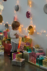 A helpful elf arranging our presents just so.