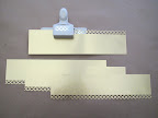 Next, I punched one edge of each of the strips with the 