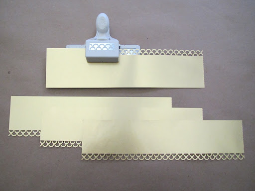 Next, I punched one edge of each of the strips with the 
