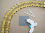 I then glued all four of the strips together with hot glue to form one long strip.