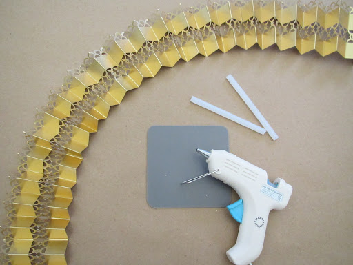 I then glued all four of the strips together with hot glue to form one long strip.