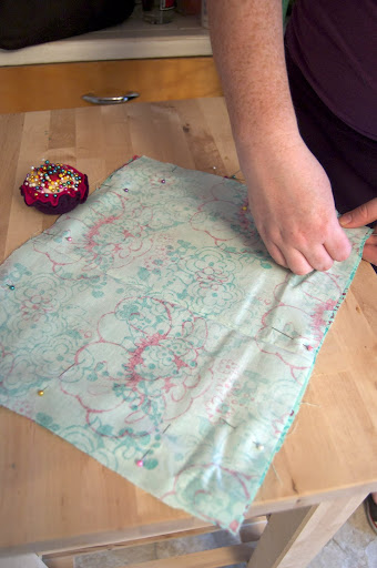 To make the accessory case, first pin 2 pieces of fabric, right sides together. Sew around the case, leaving a 4 To make the accessory case, first pin 2 pieces of fabric, right sides together. Sew around the case, leaving a 4