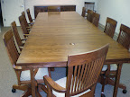 80 x 50 Mission Dining Table with added Leaves and Lancaster Swivel Chairs, Oak Hardwood, Lexington Finish