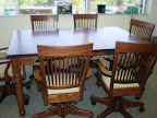 50 x 42 Mission Dining Table with added Leaves and Lancaster Swivel Chairs, Oak Hardwood, Lexington Finish