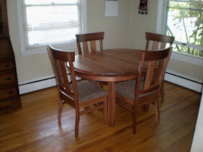 50 x 42 Woodland Dining Table with Oval Tabletop and Notched Table Edge, Monaco Chairs, Calico Hickory