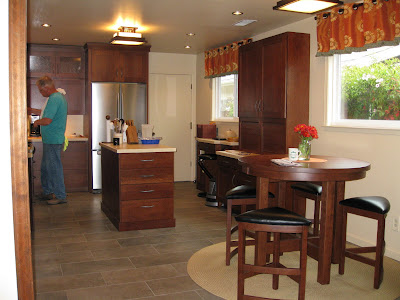 42 Inch Diameter Barcelona Table Shown in Chocolate Cherry, Shown with Barcelona Barstools