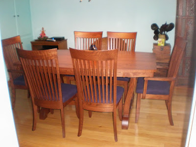 70 x 42 Western Dining Table, Curved Tabletop, Custom Lancaster Chairs with Fabric Seats, Mahogany oak