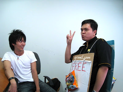 Simon with the peace sign.