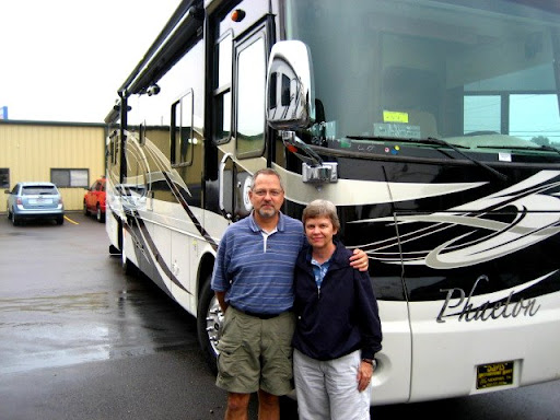 Randy and Pam in front of their New House