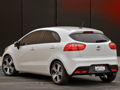2012-Kia-Rio-5-Door-Hatchback-Rear-Side-View%5B3%5D.jpg
