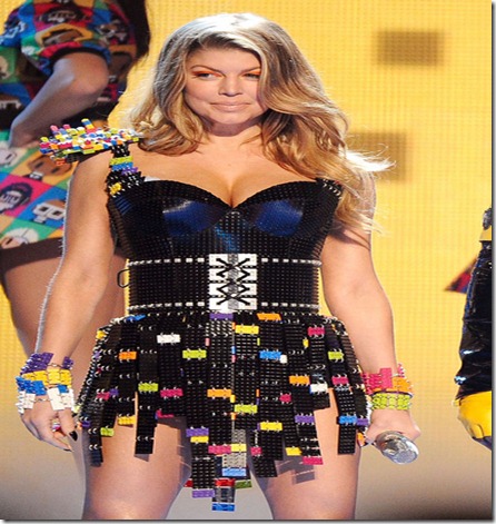 (L-R) Fergie, will.i.am and Taboo of the Black Eyed Peas perform