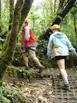 Matt and Kathy walking along the path to get to our zipline tour.  You'll notice the cement waffles -- this system prevents the walkways from turning into utter mud-traps and is great for long hikes.  It probably reduces the impact of foot traffic on the rainforest, too.