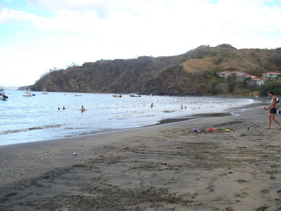 The next few photos contrive a panorama of the beachfront that lay in front of our hotel room's back door.  While Ocotal Resort looks dirty because of the black sand, it's very clean and fine.