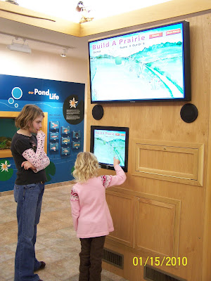 Photo caption: The finished exhibit. Annalisa Holz, daughter of county employee Pamela Holz, and Kyleigh Dolan, daughter of county employee Kathy Dolan, check out the new display. (Courtesy of Washington County Conservation) Photo caption: The finished exhibit. Annalisa Holz, daughter of county employee Pamela Holz, and Kyleigh Dolan, daughter of county employee Kathy Dolan, check out the new display. (Courtesy of Washington County Conservation)