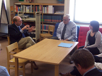 Congressman Dave Loebsack (Left) talks with WCSD Supt. Dave Sextro (Center) and Food Service Director Yota Giardino (Right) (KCII NEWS)