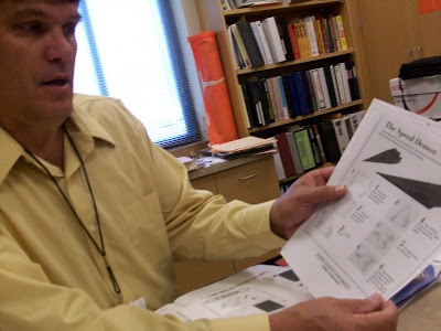 Lincoln Principal Dave Hoffman displays some the activities kids and families will take part in during the family science night (9/15/09 KCII NEWS)