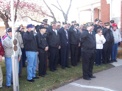 Veterans salute the Flag during Taps at the Blair House on Veterans Day (11/11/09 - KCII News)