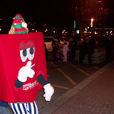 A gift from U.S. Bank walks during the 15th Annual Holiday Lighted Parade in Downtown Washington (KCII NEWS)