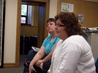 Attorneys Julie Gilmere (Front) and Patricia Lipski express concern over the DHS restructuring at the Washington County Board of Supervisors Meeting