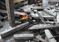 Parts of the main beam have fallen to the floor from areas shown in the previous two photos.<br />
(Washington City Hall)