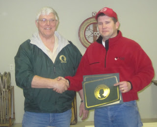 Izaak Walton League of America’s National Director for Iowa Marion Streigel (left) presenting award to Jeb Grimm