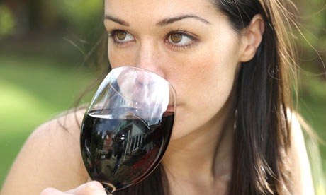 [Young-woman-drinking-a-gl-002[5].jpg]