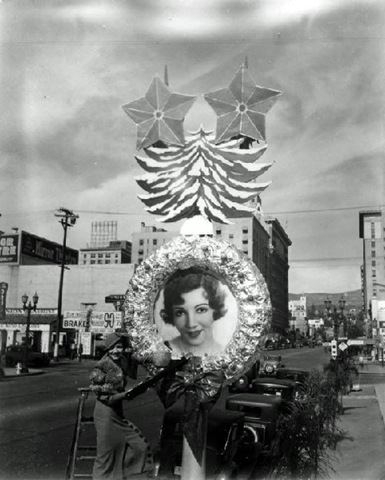 [Claudette Colbert next to her image on a Christmas decoration near Hollywood and Vine.[5].jpg]
