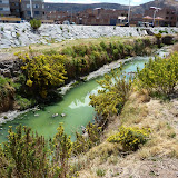 Neon green sewerage ditch in front of Lake Titicaca. Somehow you think the town planners missed a trick or two here.