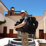 Al assumes "The Position" for carrying the bags
