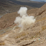 Ka-BAMM!! Dee reflexively presses the button on the camera to catch the explosion