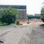 On top of the asphalt pile looking east where the subway used to emerge from below ground