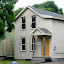 Quinton passing by 416 Maple Street.
