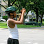Arie takes a photo of his house.