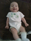 The shirt says "Too cute for words". I love that shirt.