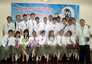 February 24: Students pose behind the Nestle tarpaulin.