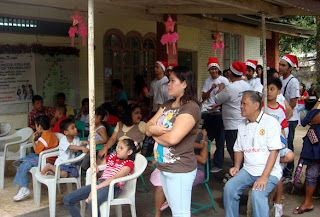 Parents and kids who are recipients of the gifts