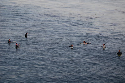 Symbolic California spiritual status: like surfers waiting for waves.