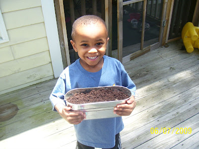 Zayveon holding his planter