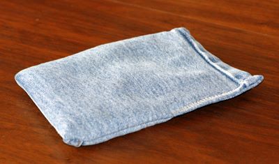 soft bracing bag of shotgun shot in an old denim jeans leg