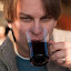 Thomas drinks vin chaud (hot spiced wine)