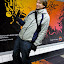 Thomas plays air guitar in the subway