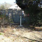 Landfills and residential areas are often close. Here a gas monitoring well is installed between a landfill and adjacent residence to provide early warning of gas migration toward the structure.