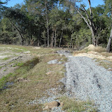 A typical closed landfill requires continuous maintenance. Here bare areas are photographed and reseeding is recommended to the owner along with improving drainage to prevent ponding of water.