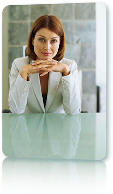 Americans Losing Confidence as Debt Relief Seems a Long Way Off A woman with red hair in a white suit jacket. Does she need debt relief?
